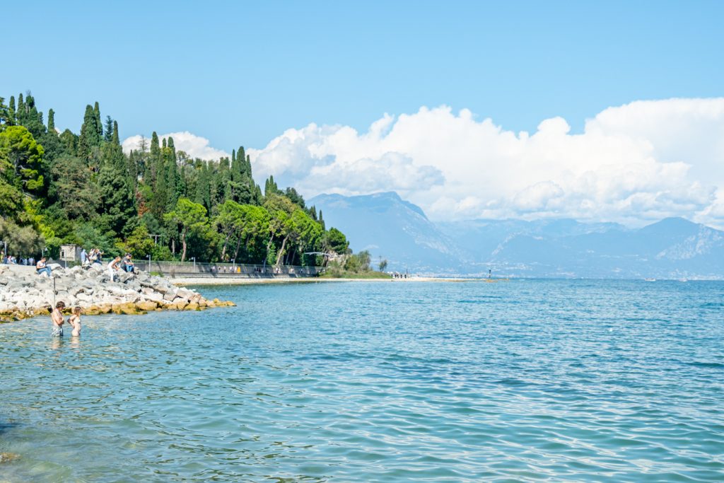 view of lake garda from one of the best sirmione beaches