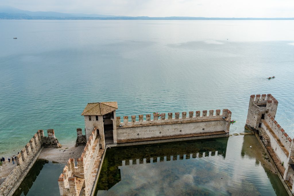 view of defensive walls of sirmione castle in lake garda as seen from above