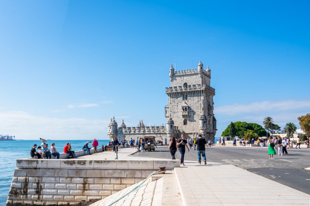 view of belem tower from along the tagus river when approaching it in belem lisbon