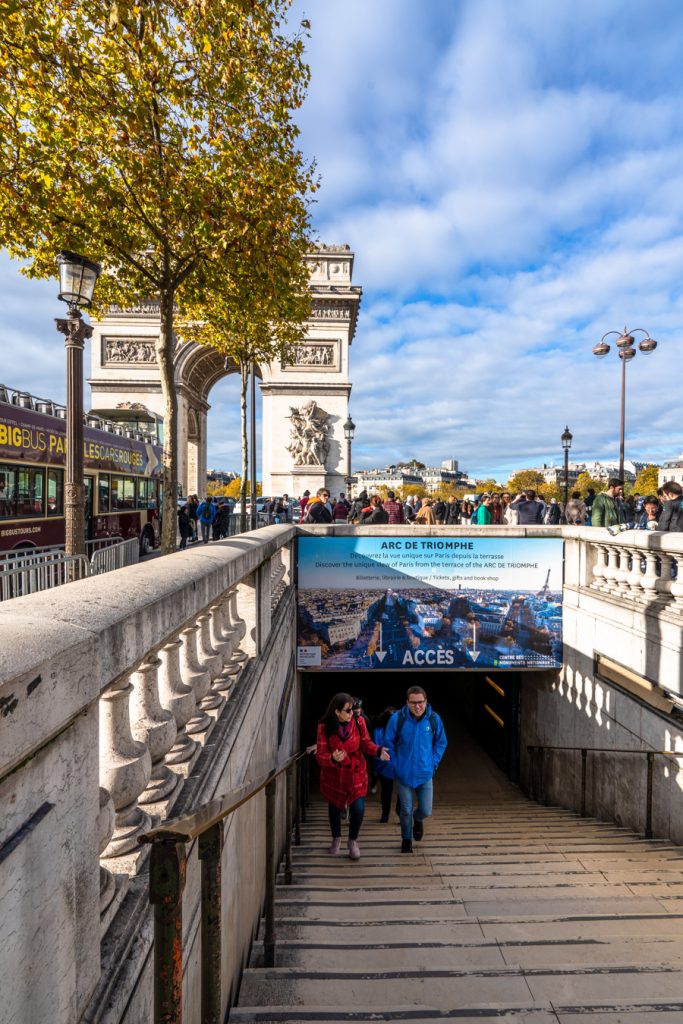 staircase to the underground passage to access underneath the arc de triomphe with arch visible in the background