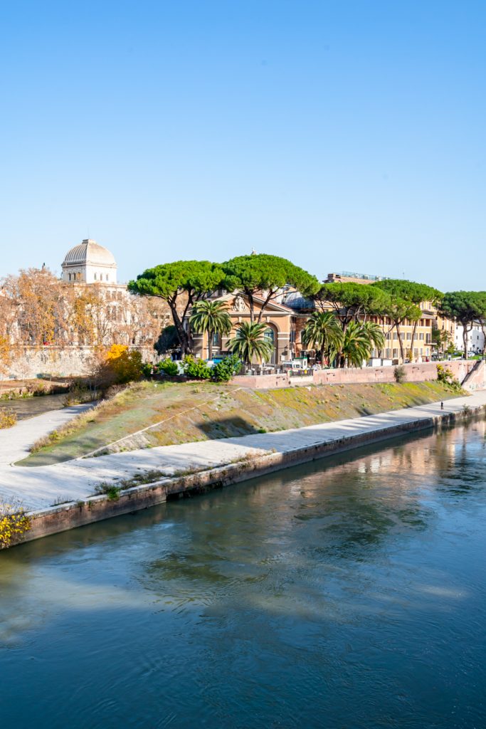 view of tiber island from a bridge across the tiber, one of the offbeat rome places to visit