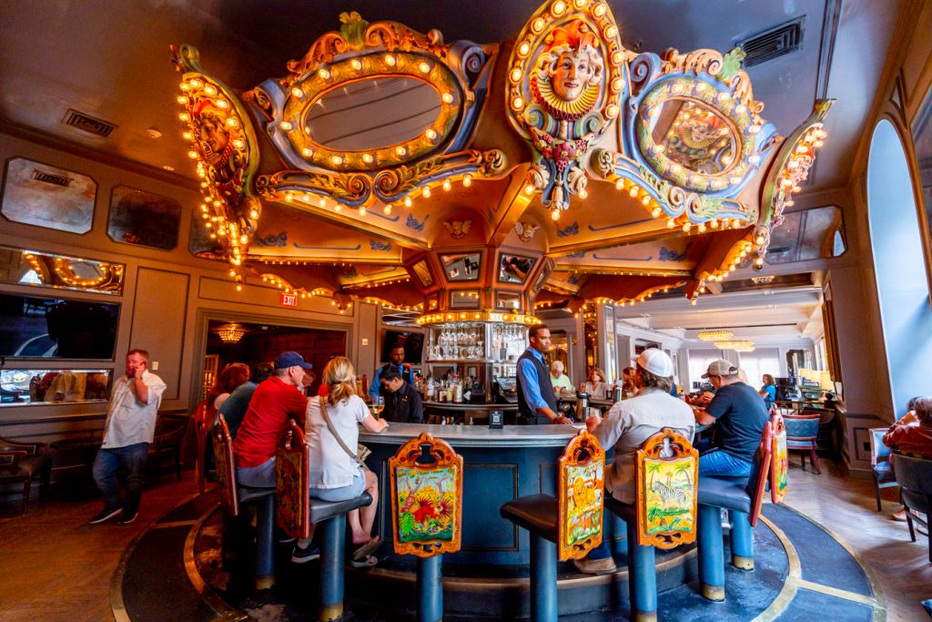 new orleans carousel bar with a few patrons sitting at it