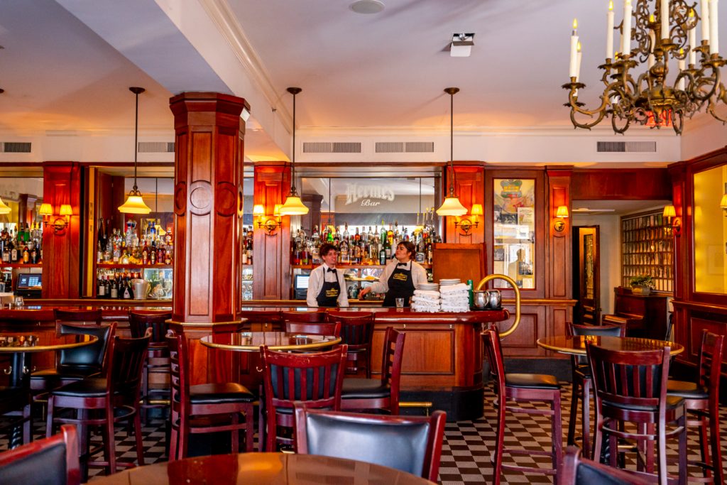 interior of a new orleans restaurant preparing for the evening service