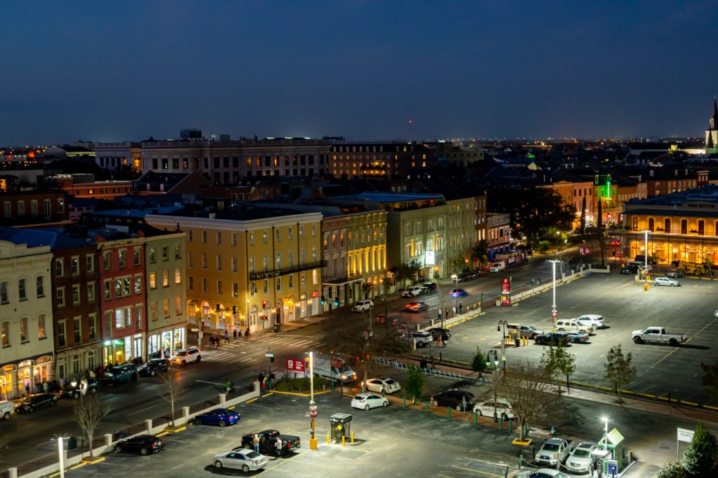 view of nola at night from above the french quarter