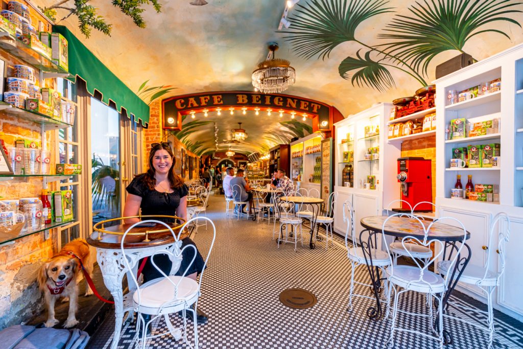 kate storm and ranger storm inside cafe beignet during 3 days new orleans itinerary