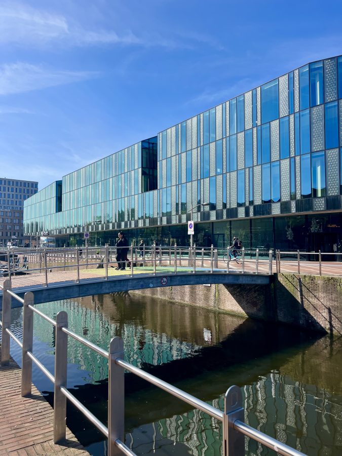 glass exterior of train station in delft the netherlands