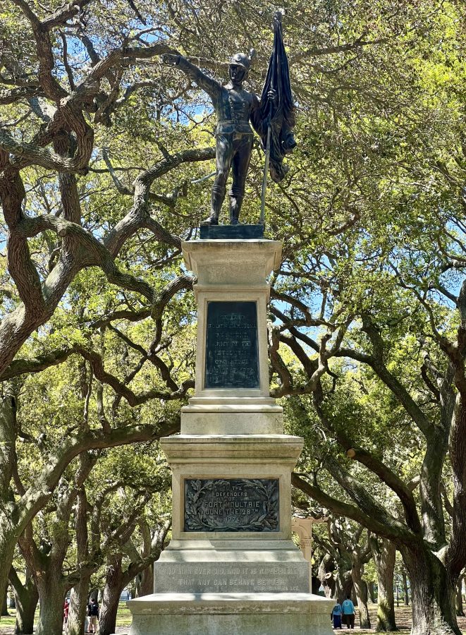 statue surrounded by oak trees in white point garden, one of the prettiest places to visit in charleston south carolina