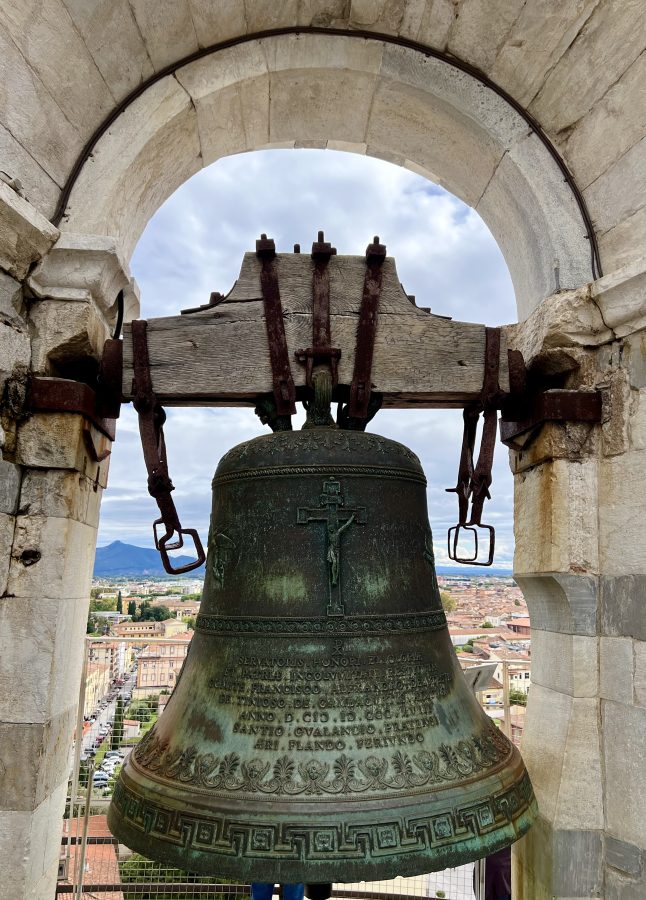 brass bell at the top of the leaning tower of pisa italy