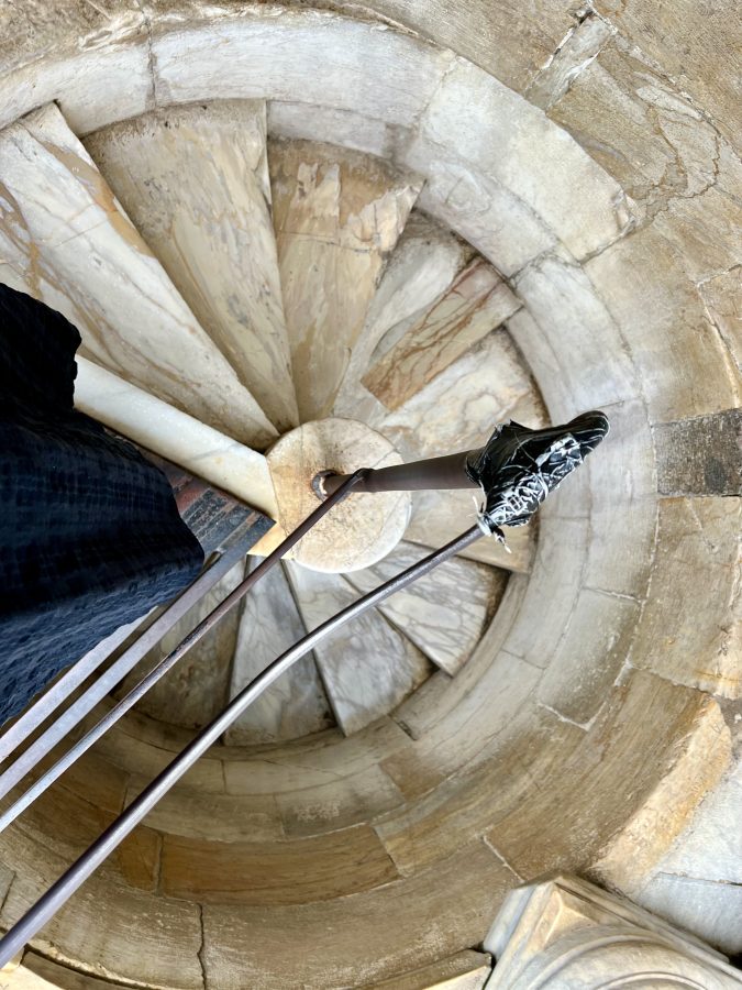 view looking down into the spiral staircase from the top of the pisa bell tower