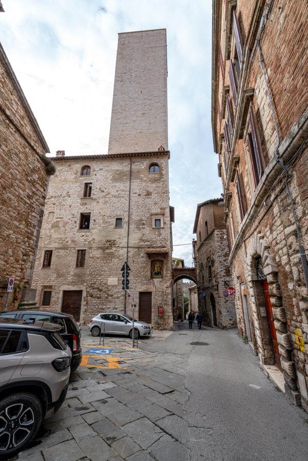 view of sciri tower stretching above other rooftops in perugia italy