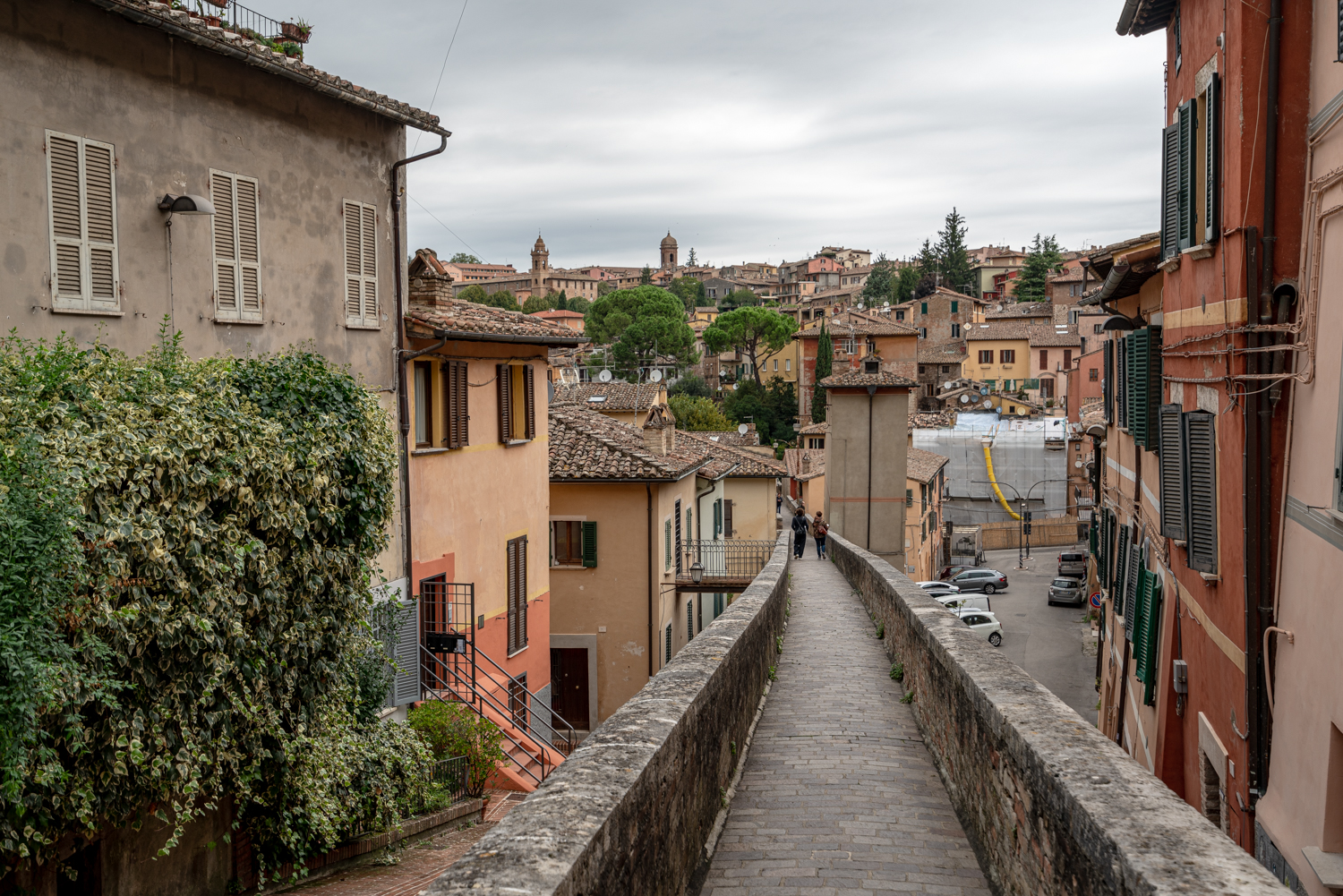 view of perugia aqueduct jutting out amongst historical center