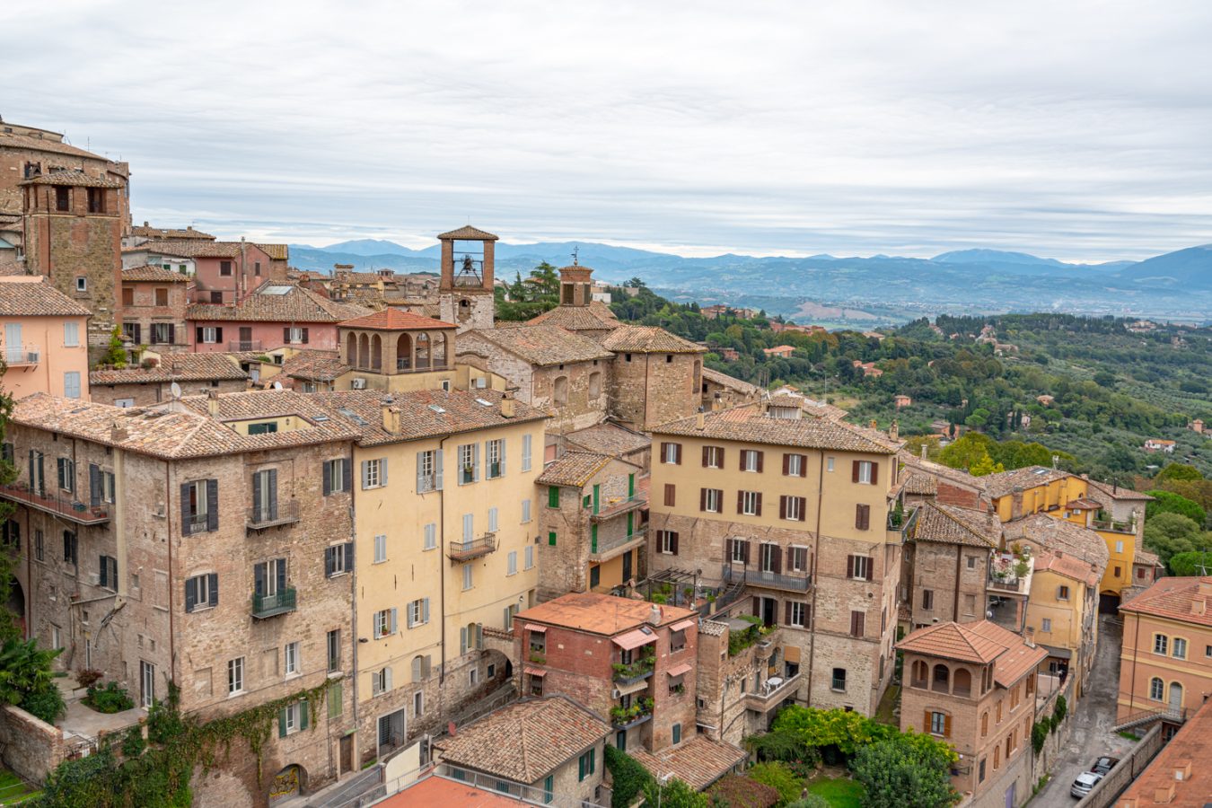 view of perugia and countryside of umbria italy, as seen from giardini carducci, one of the best things to see in perugia