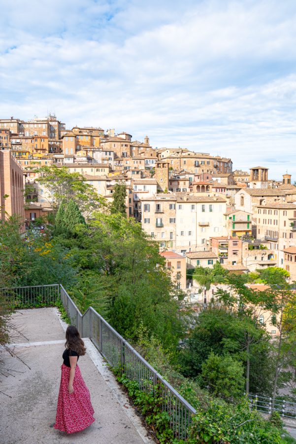 kate storm overlooking perugia italy from the giardino di pincetto, one of the best places to visit in perugia